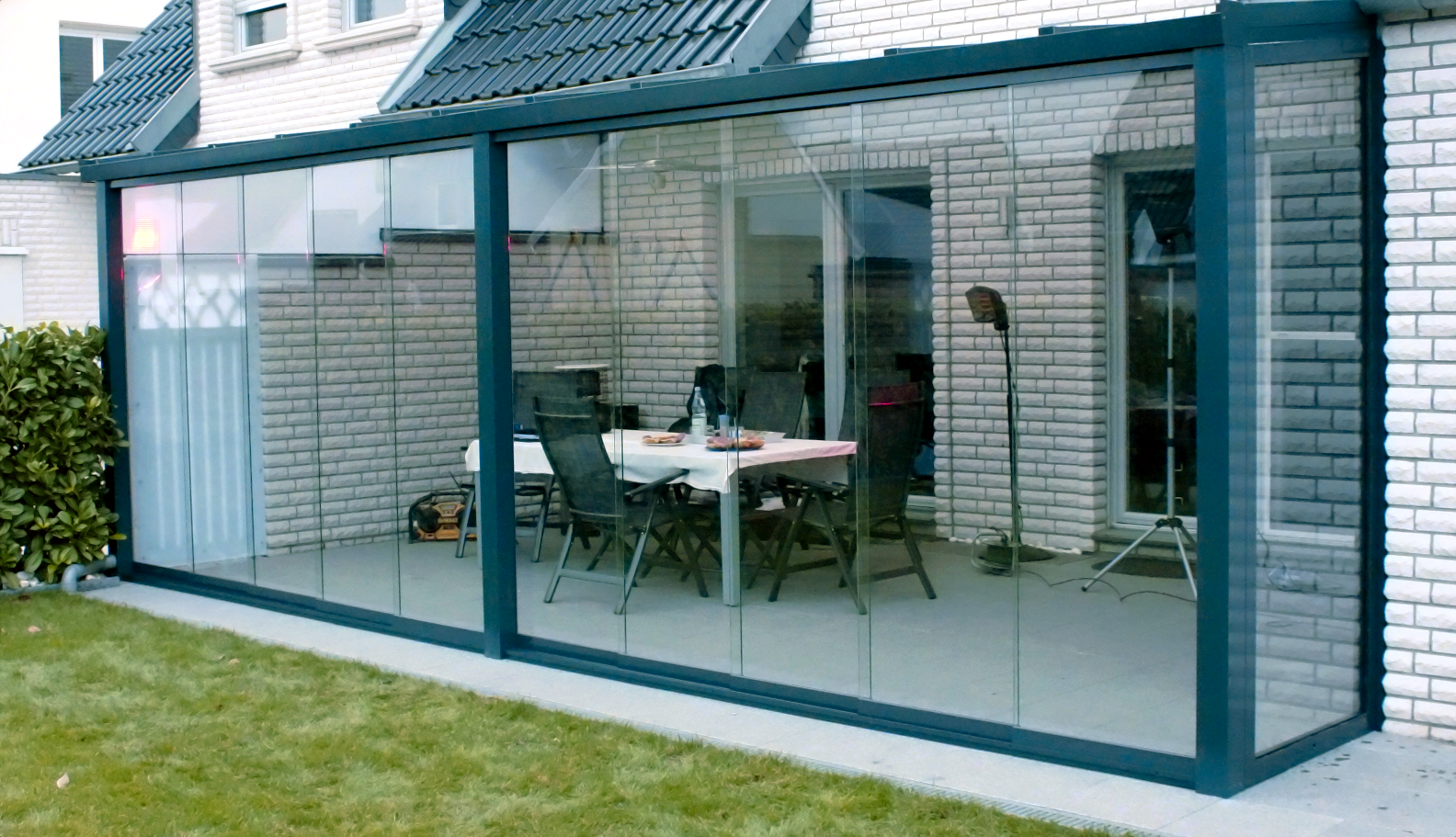 Glazen schuifwand voor veranda Glazen schuifwand voor veranda